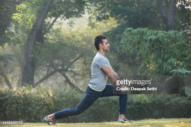photo of a young man - stock image - physical activity stock pictures, royalty-free photos & images