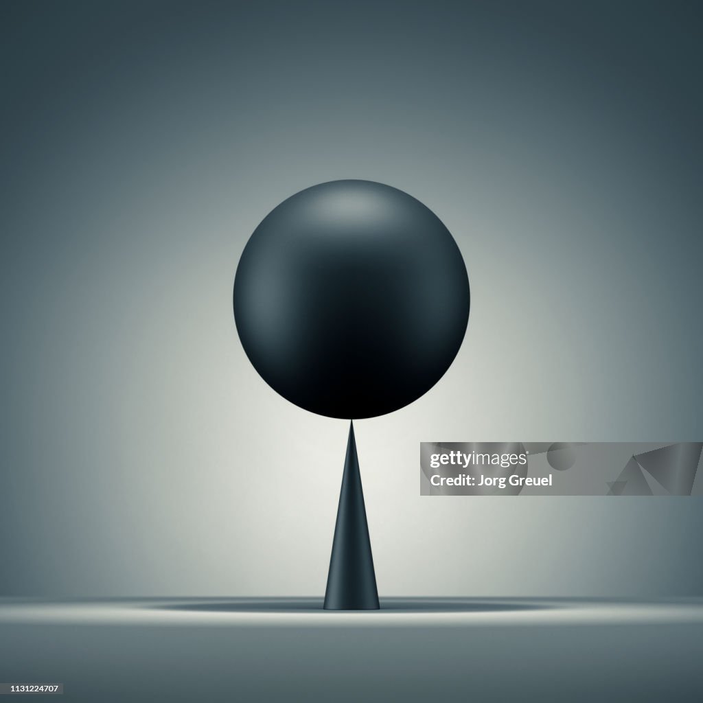 Sphere balancing on a cone