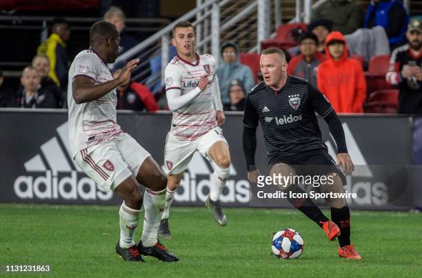 United forward Wayne Rooney dribbles towards Real Salt Lake defender Nedum Onuoha during a MLS match between D.C. United and Real Salt Lake on March...