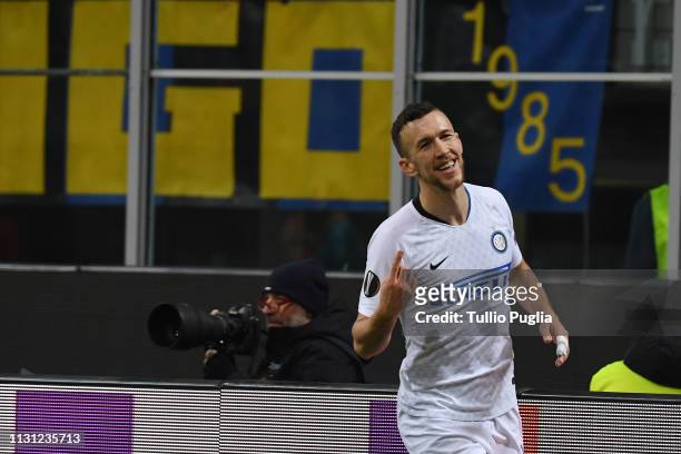 Ivan Perisic of Inter celebrates after scoriung his team's third goal during the UEFA Europa League Round of 32 Second Leg match between FC...