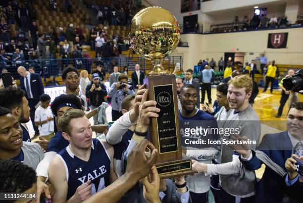 Yale Bulldogs players celebrate after defeating the Harvard Crimson and wining the Ivy League Championship on March 17 at John J. Lee Amphitheater in...