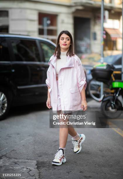 Aida Domenech is seen wearing pink jacket outside Armani on Day 2 Milan Fashion Week Autumn/Winter 2019/20 on February 21, 2019 in Milan, Italy.