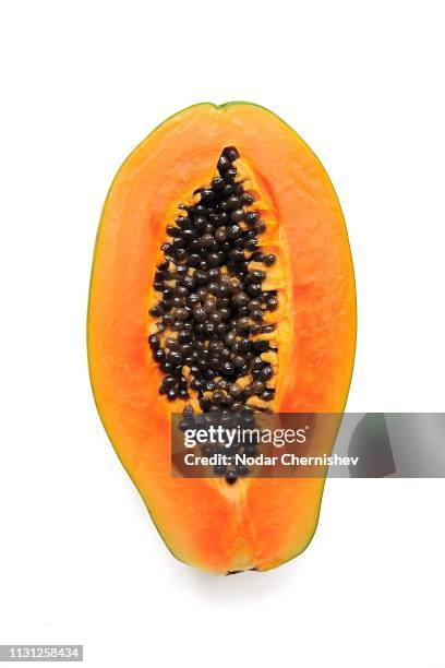 cross-section-of-papaya-against-white-background