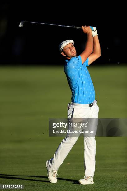 Bryson De Chambeau of the United States plays his second shot on the 18th hole during the first round of World Golf Championships-Mexico Championship...