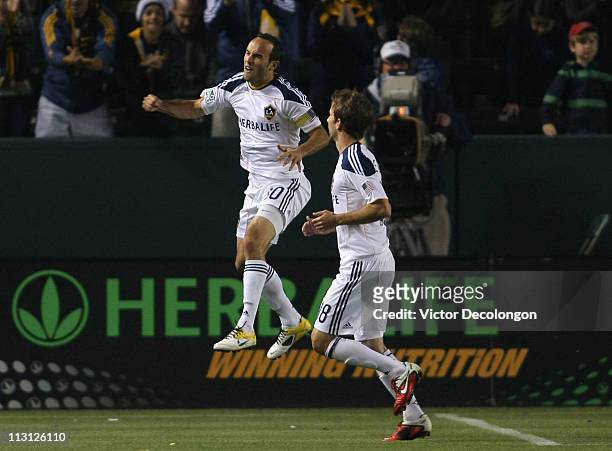 Landon Donovan of the Los Angeles Galaxy celebrates after converting a penatly kick against the Portland Timbers in the first half during the MLS...