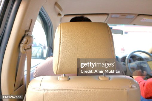 https://media.gettyimages.com/id/1131267484/photo/back-view-of-vehicle-or-car-seats.jpg?s=170667a&w=gi&k=20&c=Dcej-iQxNNjJMCFdPefzLE83PZjUSP-R4r8WofMCSEg=