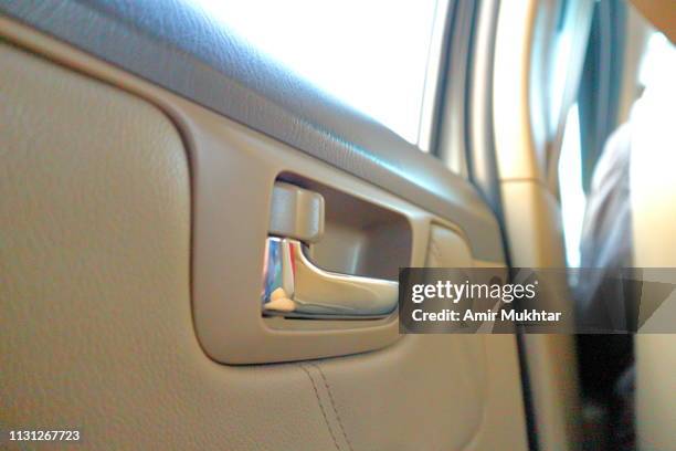 car or vehicle inside door lock lever - door knob stock pictures, royalty-free photos & images