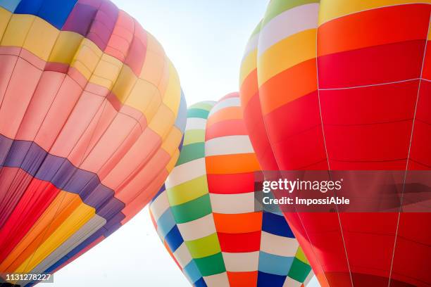 colorful pattern of three balloons outdoor with the bright sky background - gas balloons bildbanksfoton och bilder