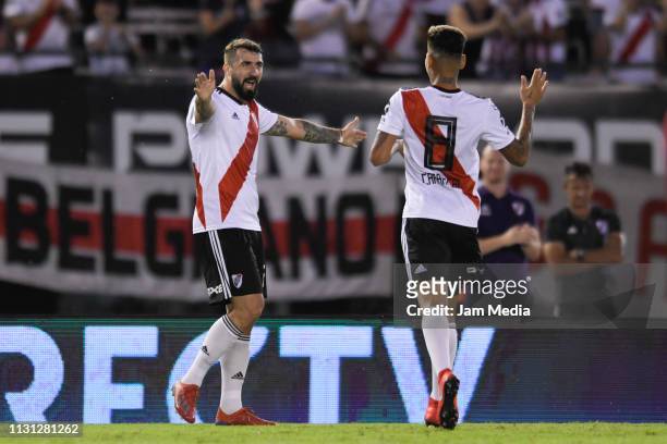 Lucas Pratto of River Plate celebrates with teammate Jorge Carrascal after scoring the third goal of his team during a match between River Plate and...