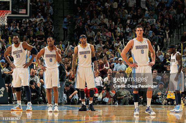 Nene Hilario, Arron Afflalo, Kenyon Martin, Danilo Gallinari and Ty Lawson of the Denver Nuggets look on as they await action against the Oklahoma...