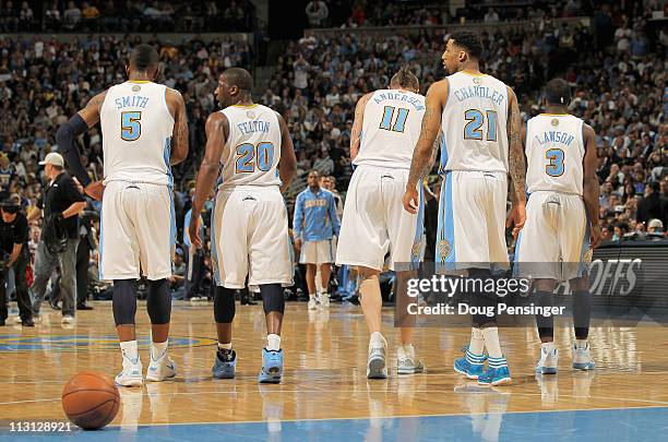 Smith, Raymond Felton, Chris Andersen, Wilson Chandler and Ty Lawson of the Denver Nuggets head to the bench during a time out against the Oklahoma...