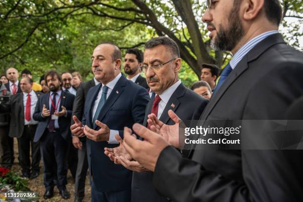 Turkey's Vice-President Fuat Oktay and Foreign Minister Mevlut Cavusoglu pray near Al Noor mosque on March 18, 2019 in Christchurch, New Zealand. 50...