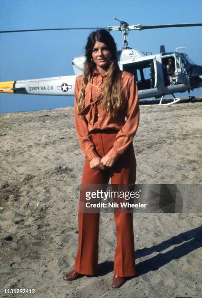 American actress Katherine Ross stands on location of film set for disaster movie " The Swarm" directed by Irwin Allen in Los Angeles, circa 1977