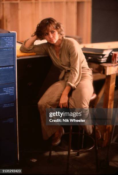 Actress Sally Field sits on set during filming of "Beyond the Poseidon Adventure" in film studio in Hollywood, California, USA, circa 1978