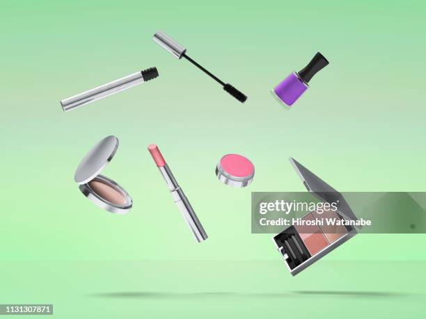 cosmetics and sweets in the air. - lipstick photography stock pictures, royalty-free photos & images