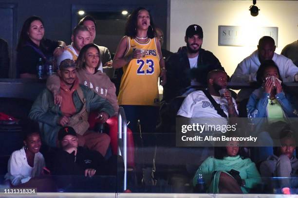 Rihanna attends a basketball game between the Los Angeles Lakers and the Houston Rockets at Staples Center on February 21, 2019 in Los Angeles,...