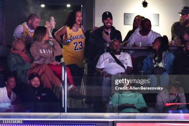 Rihanna attends a basketball game between the Los Angeles Lakers and the Houston Rockets at Staples Center on February 21, 2019 in Los Angeles,...