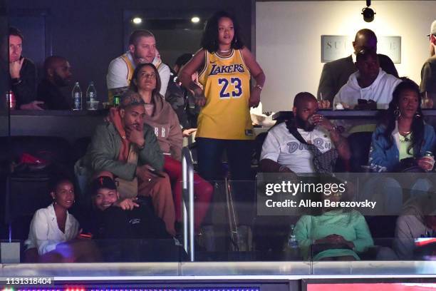 Rihanna attends a basketball game between the Los Angeles Lakers and the Houston Rockets at Staples Center on February 21, 2019 in Los Angeles,...