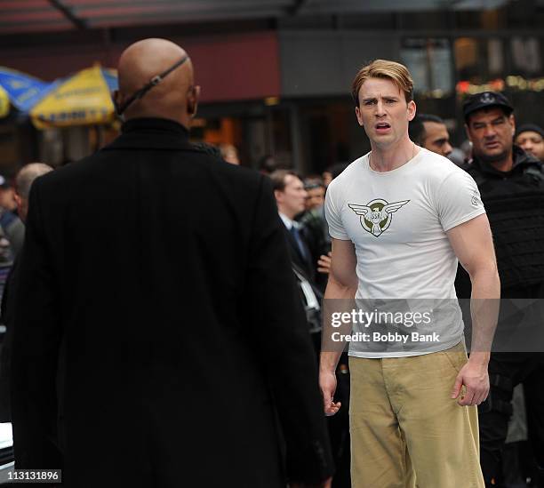 Samuel L. Jackson and Chris Evans filming on location for "Captain America: The First Avenger" on the streets of Manhattan on April 23, 2011 in New...