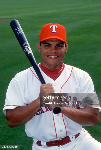 Catcher Ivan Rodriguez of the Texas Rangers poses for this portrait during Major League Baseball spring training circa 1996 at Municipal Stadium in...