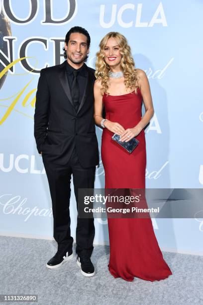 Benjamin Larretche and Petra Nemcova arrive at the 2019 Hollywood For Science Gala at Private Residence on February 21, 2019 in Los Angeles,...