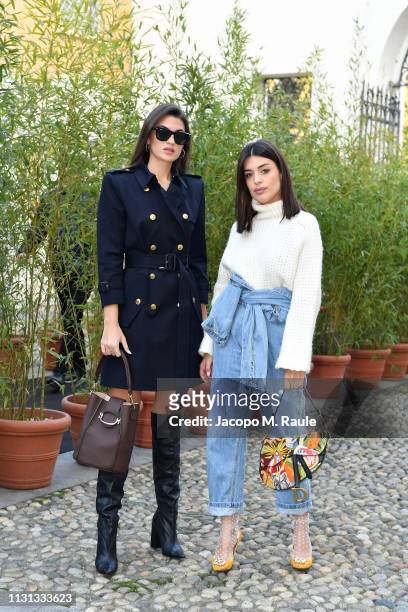Marta Lozano and Aida Domenech attend the Tod's show at Milan Fashion Week Autumn/Winter 2019/20 on February 22, 2019 in Milan, Italy.