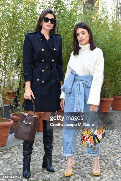 Marta Lozano and Aida Domenech attend the Tod's show at Milan Fashion Week Autumn/Winter 2019/20 on February 22, 2019 in Milan, Italy.