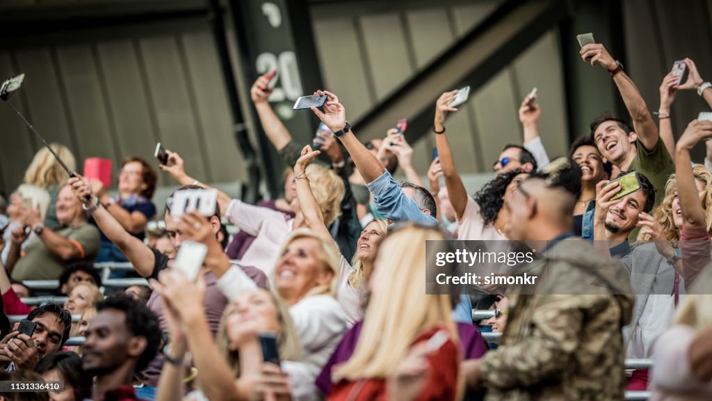 Spectators Cheering Tools Group Of Spectators Cheering In Stadium High-Res Stock Photo - Getty Images