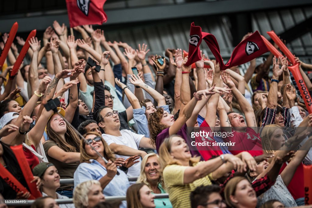 Spectators Cheering Tools Spectators Cheering In Stadium High-Res Stock Photo - Getty Images