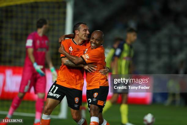 Eric Bautheac of Brisbane Roar and team mate Henrique celebrate a goal during the Round 20 A-League Match between the Central Coast Mariners and...