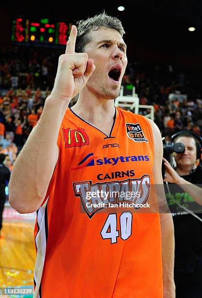 Alex Loughton of the the Taipans celebrates after winning game two of the NBL Grand Final series between the Cairns Taipans and the New Zealand...