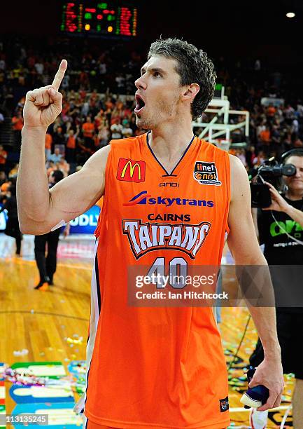 Alex Loughton of the the Taipans celebrates after winning game two of the NBL Grand Final series between the Cairns Taipans and the New Zealand...