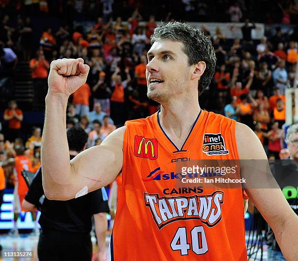 Alex Loughton of the the Taipans celebrates after winning game two of the NBL Grand Final series between the Cairns Taipans and the New Zealand...