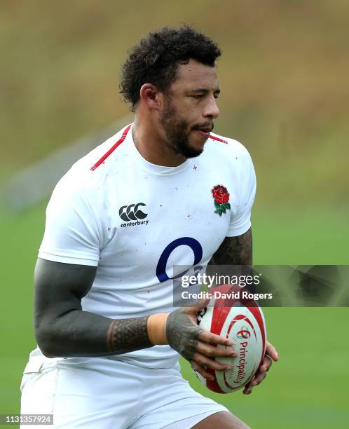 Courtney Lawes runs with the ball during the England captains run held at Pennyhill Park on February 22, 2019 in Bagshot, England.