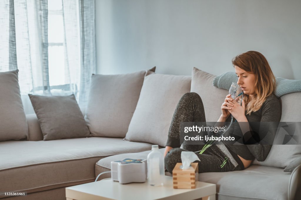 Woman is wearing a breathing mask