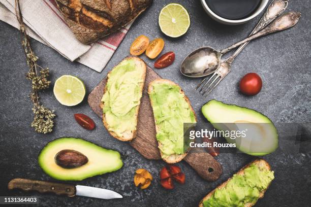 healthy green veggie avocado sandwich - whole wheat sandwich stock pictures, royalty-free photos & images