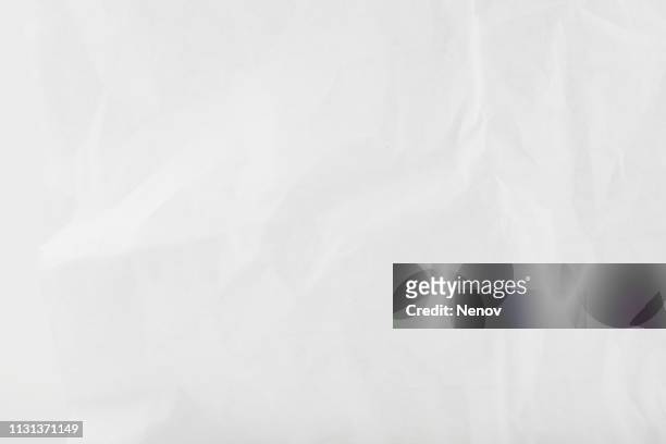 texture of crumpled white paper - crumpled paper stock-fotos und bilder