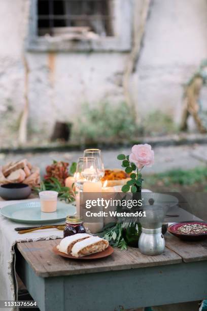 laid garden table with candles - burns supper stock pictures, royalty-free photos & images