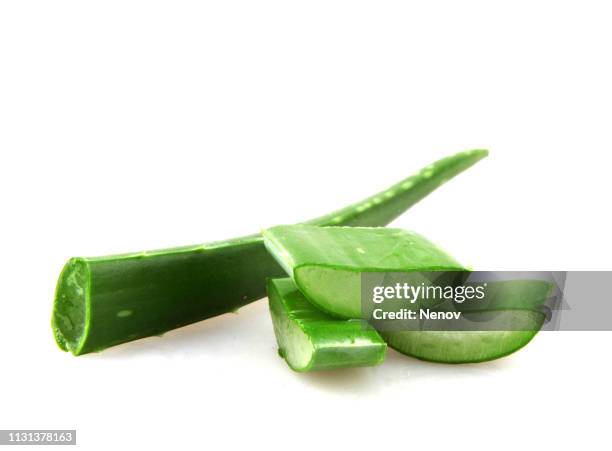 close-up of aloe vera slice on white background - aloe slices stock pictures, royalty-free photos & images