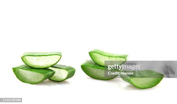 close-up of aloe vera slice on white background - aloe slices stock pictures, royalty-free photos & images