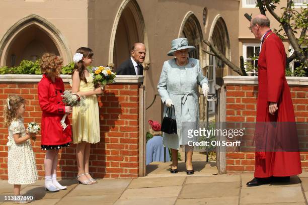 Queen Elizabeth II and Prince Philip, Duke of Edinburgh, leave the Deanery of St George's Chapel in Windsor Castle after attending the Easter Matins...