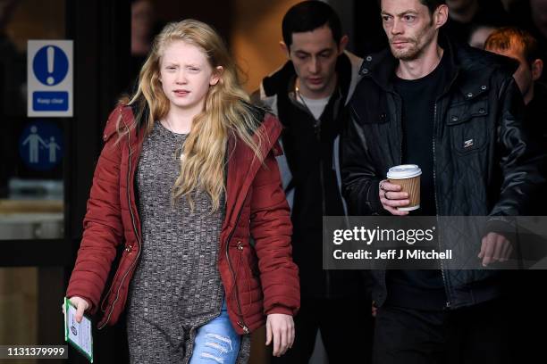 Alesha MacPhail's mother Georgina Lochrane leaves Glasgow High Court following the judge lifting the ban on his anonymity on February 22, 2019 in...