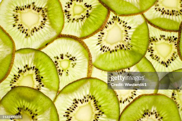 slices of kiwi, close-up - thin stock pictures, royalty-free photos & images