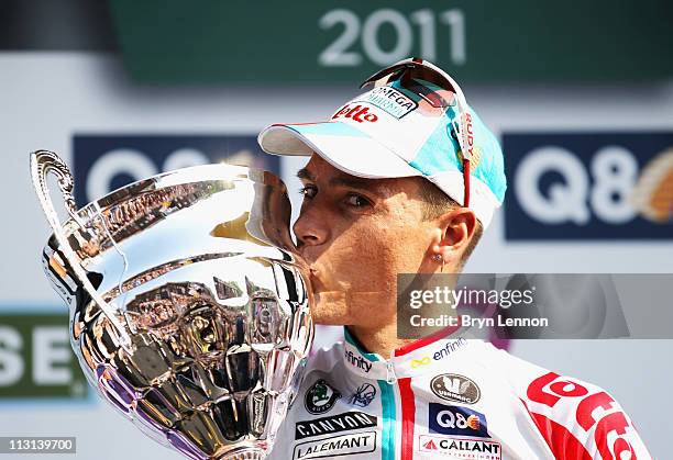 Philippe Gilbert of Belgium and Omega Pharma-Lotto kisses the trophy after winning the 97th Liege-Bastogne-Liege race on April 24, 2011 in Liege,...