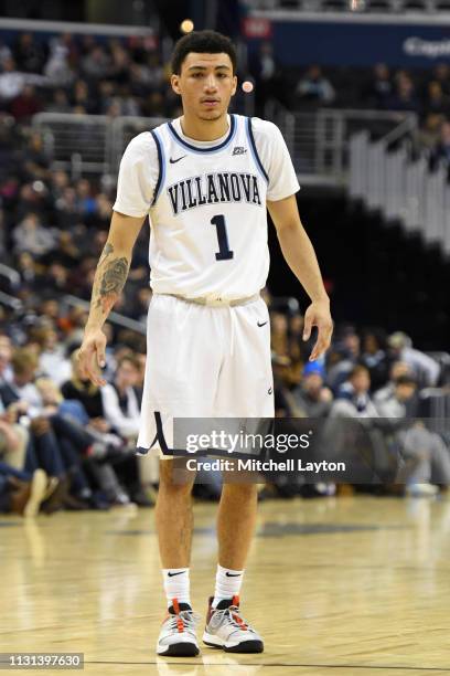 Jahvon Quinerly of the Villanova Wildcats looks on during a college basketball game against the Georgetown Hoyas at the Capital One Arena on February...