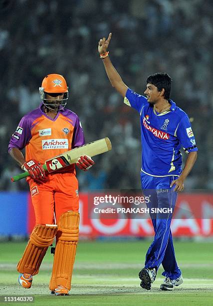 PACKAGERajasthan Royals bowler Siddharth Trivedi gestures as he celebrates the wicket of Kochi Tuskers Kerala batsman Raiphi Gomez during the IPL...