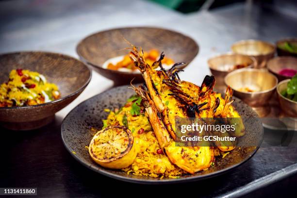 king prawn biryani - ready to serve - dubai food stock pictures, royalty-free photos & images