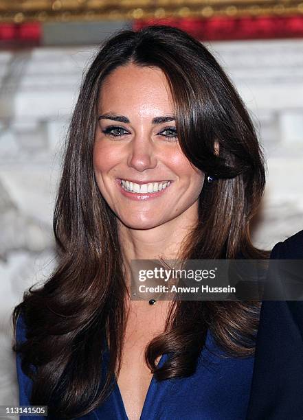 Prince William and Catherine Middleton pose for photographs in the State Apartments of St James Palace as they announce their engagement on November...