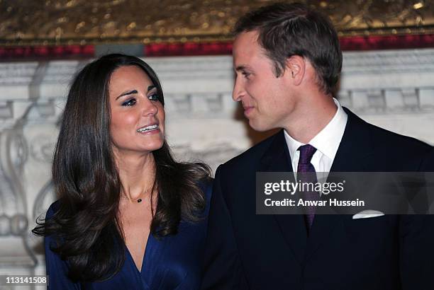 Prince William and Catherine Middleton pose for photographs in the State Apartments of St James Palace as they announce their engagement on November...