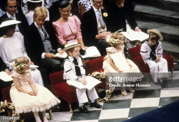 Bridesmaids Zara Phillips and Laura Fellowes and page boys Seamus Luedecke and Prince William attend the wedding of Prince Andrew, Duke of York and...